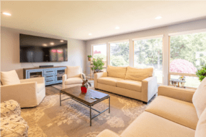 A living room with couches and tables in it